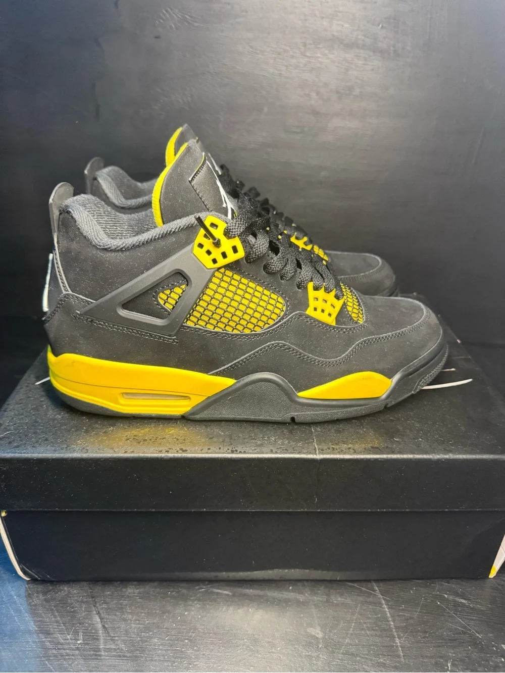 Jordan Men’s Black and Yellow Retro Sneakers